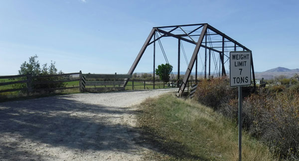 Steel truss bridge posted at 7 tons. Located approximately 8 miles west of Sheridan, MT, and carries Silverbow Lane over the Beaverhead River.