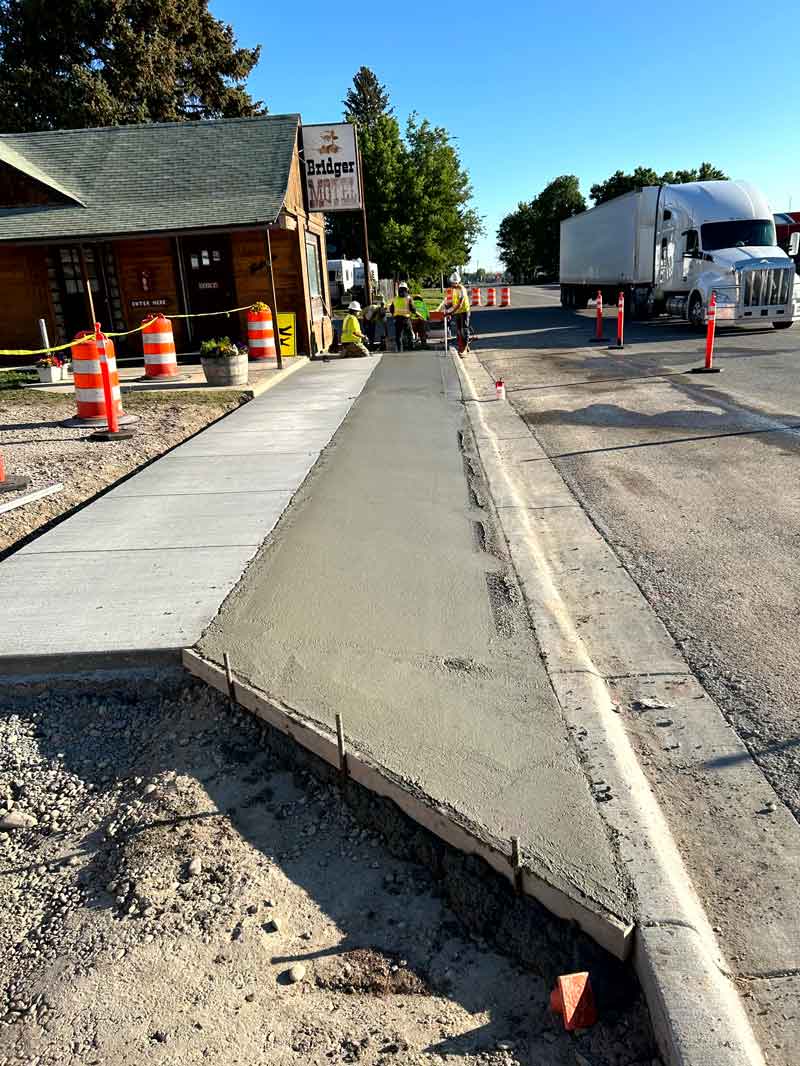 Crews constructing ADA improvements along Main Street near the Bridger Motel.