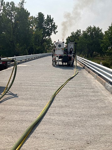 Grooving the deck on the Milk River Bridge