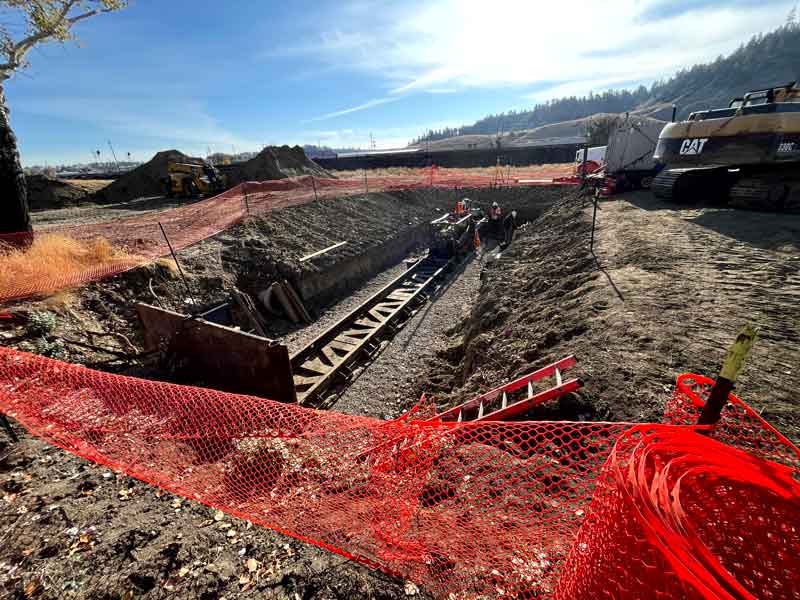 Looking south toward Front Street, crews bore pipe under the railroad for the new storm drain system.