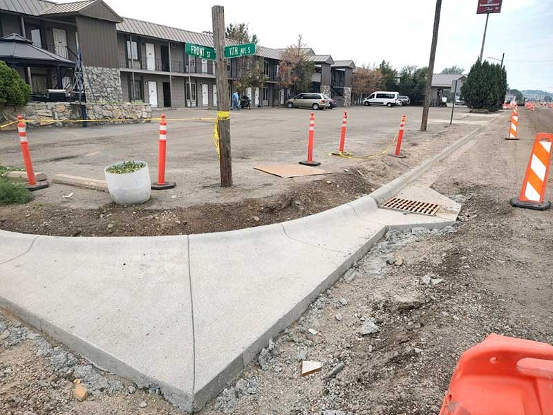 Concrete work at the southeast corner of the Front Street with 11th Avenue S. intersection.