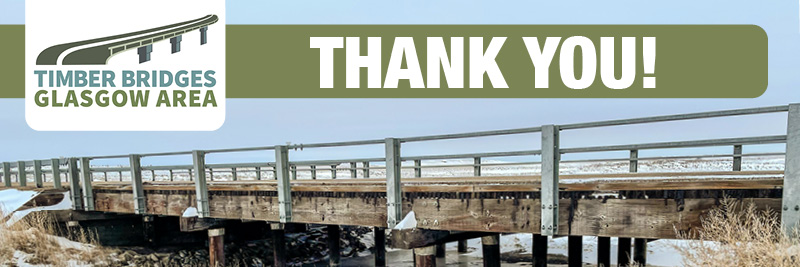 Thank you text overlaid on a photo of a timber bridge