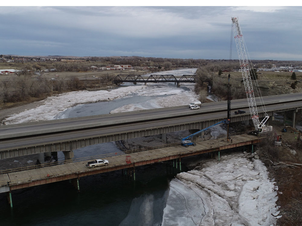 The temporary work bridge is near completion and will be used to construct the new eastbound I 90 bridge.