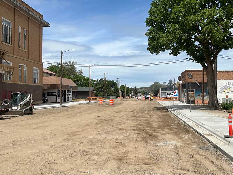 Looking north, the new sidewalk and gravel road base on North 7th Street.