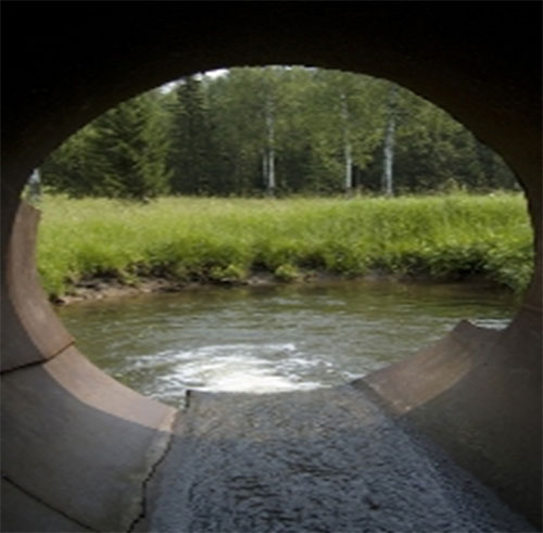 sewer drain into body of water